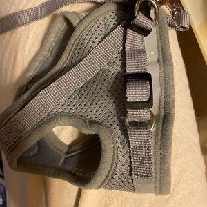 Never used. Harness and leash.